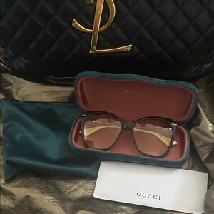 Gucci Black and Gold Sunglasses